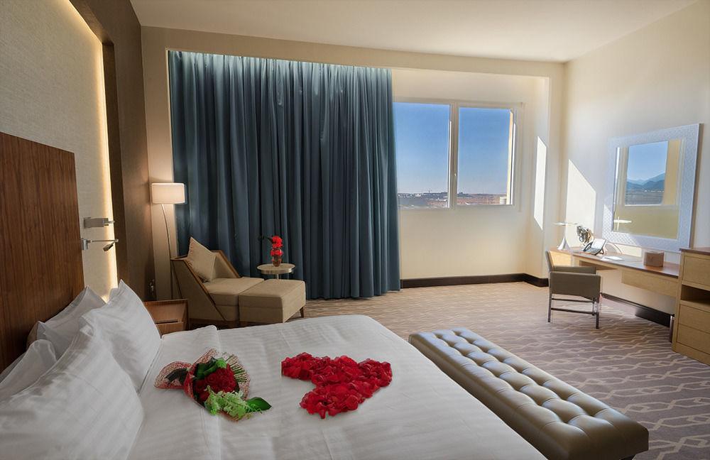 Millennium Hail Hotel Exterior photo Deluxe room